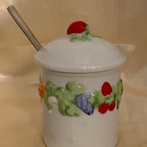 Vintage strawberry top ceramic jam jar with a lid and spoon